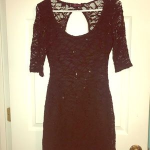 Black, backless sequin homecoming dress